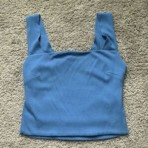 Blue medium sized tank top with open back! Brand - Illa Illa